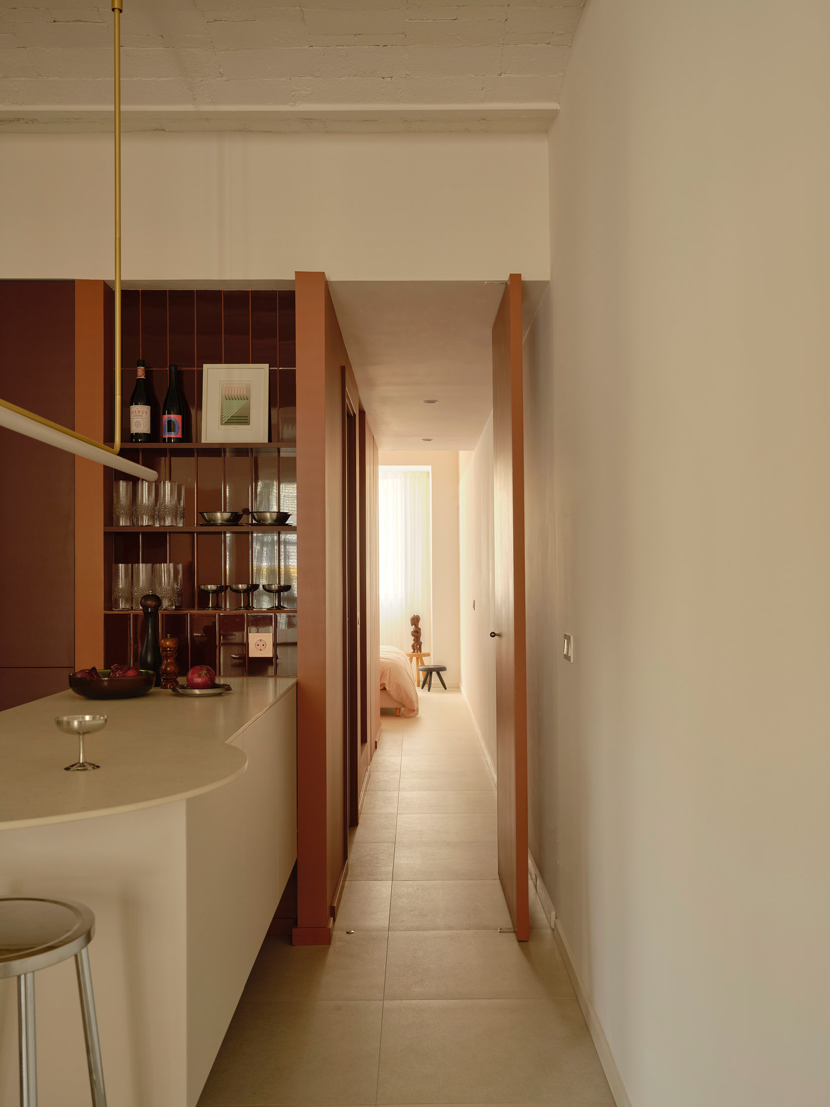 Viladomat Apartment in Barcelona by Colombo Architecture - corridor seen from the kitchen island
