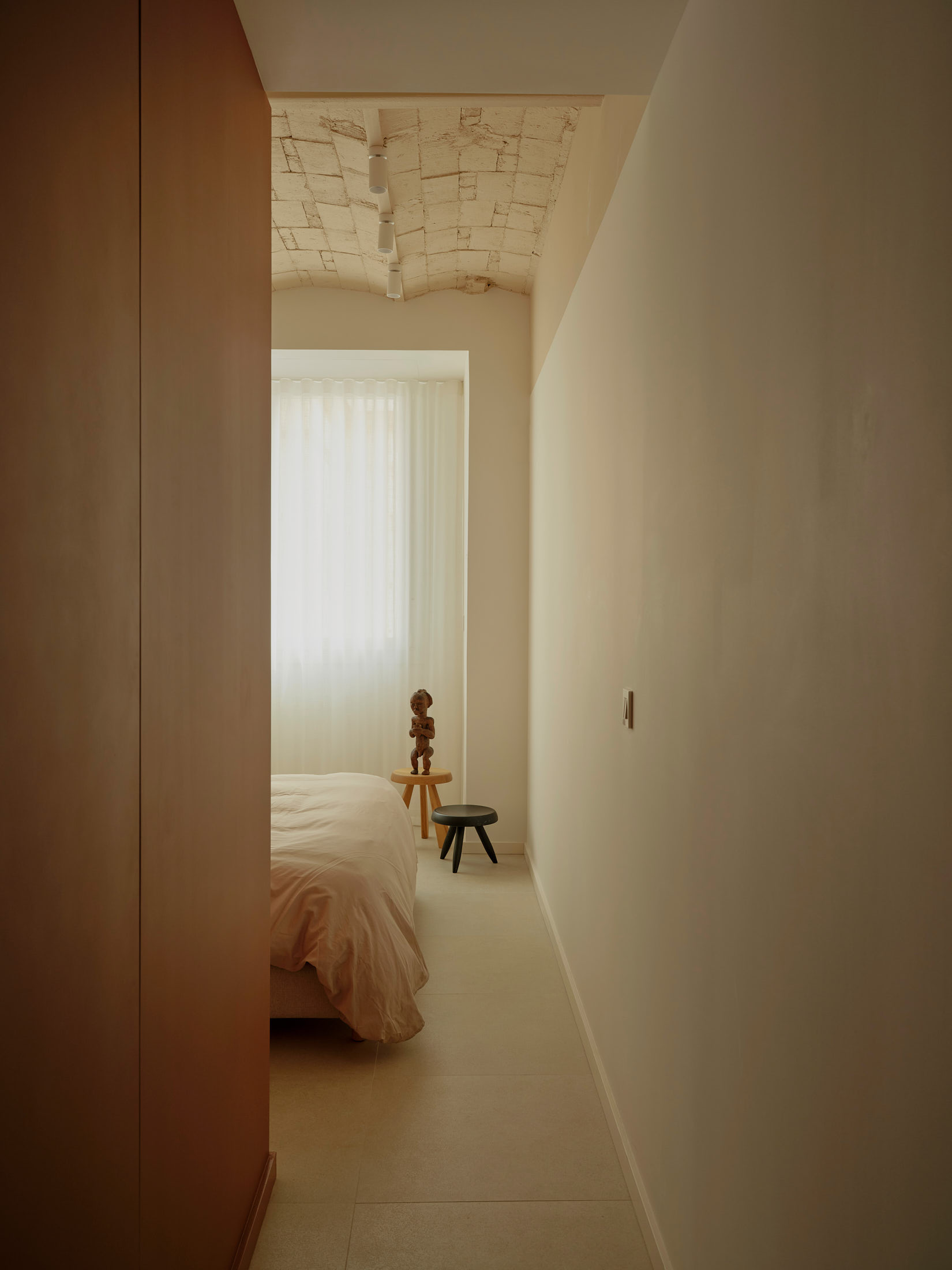 Viladomat Apartment in Barcelona by Colombo Architecture - corridor leading to the bedroom